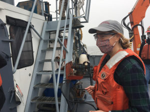 woman on a research boat